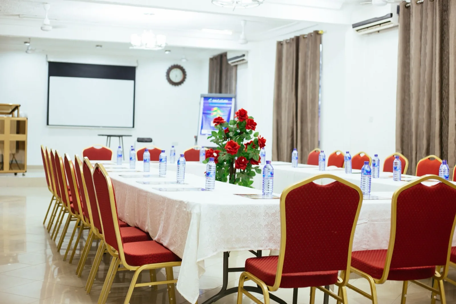 The conference hall with red chairs in a U-shape